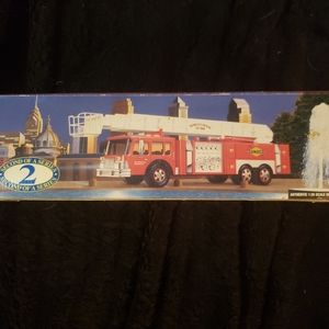1995 Sunoco aerial fire truck with lights and sirens